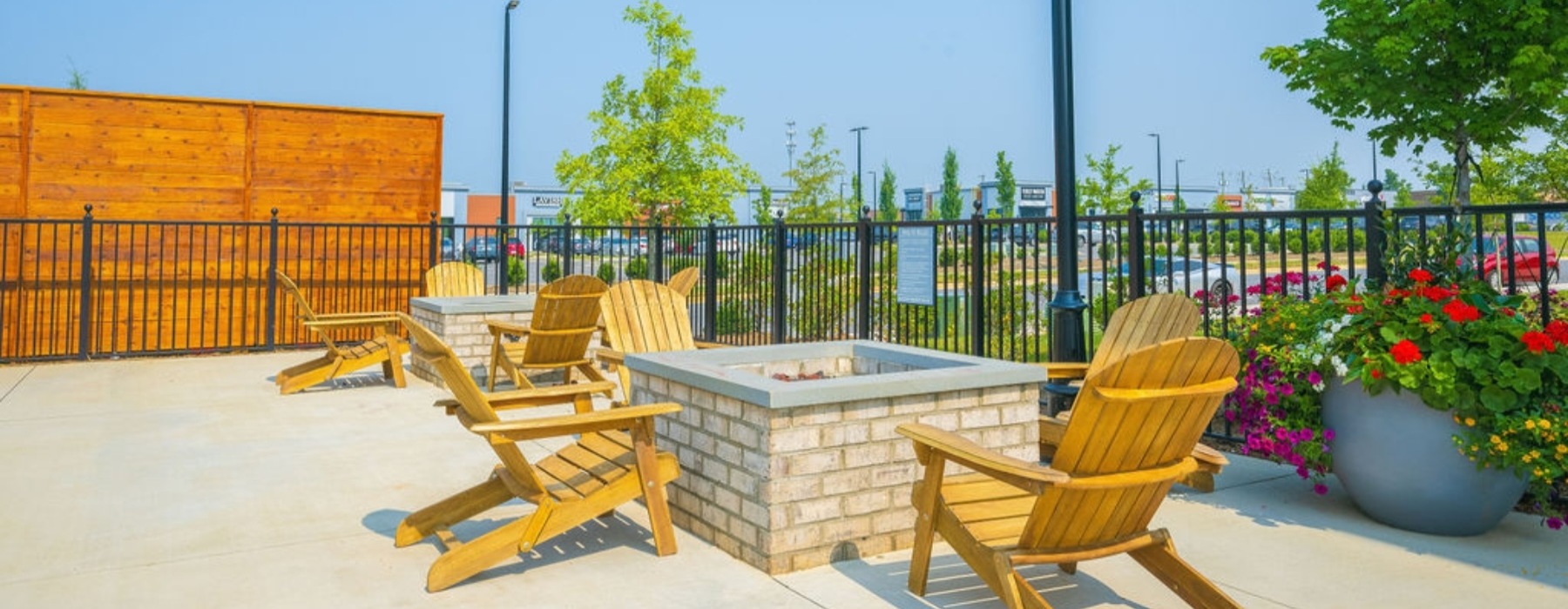 a fire pit with chairs around it