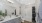 a bathroom with a tub, sink and toilet