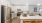 a kitchen with white cabinets